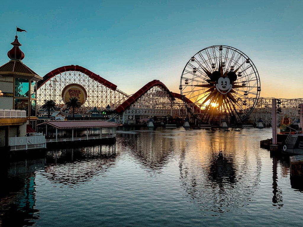 Pixar pier at sunset across lake in Disneyland California Adventure - Solo travel guide to California 